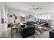 Luxury living room with a modern fireplace and mountain views at 1610 Hardrock St, Las Vegas, NV 89156