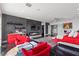 Main bedroom with red accents and a built-in fireplace at 1610 Hardrock St, Las Vegas, NV 89156