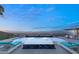 Stunning pool and spa with a spacious deck overlooking panoramic views at 1610 Hardrock St, Las Vegas, NV 89156