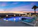 Expansive pool with a spa, fire bowls, and city views at 1610 Hardrock St, Las Vegas, NV 89156