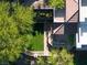 Aerial view of backyard with inground pool, patio, and artificial grass at 1635 Liege Dr, Henderson, NV 89012