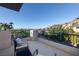 Relaxing balcony with seating and views of the lush landscaping at 1635 Liege Dr, Henderson, NV 89012