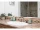 Elegant bathroom with a modern sink and stone countertops at 1635 Liege Dr, Henderson, NV 89012