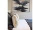 Bedroom with comfy bedding and large abstract art at 1635 Liege Dr, Henderson, NV 89012