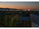 Spectacular city view at dusk, providing a picturesque backdrop and stunning light at 1635 Liege Dr, Henderson, NV 89012