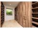 Large walk-in closet with ample shelving and drawers at 1635 Liege Dr, Henderson, NV 89012