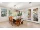 Elegant dining room with a view of outdoor living at 1635 Liege Dr, Henderson, NV 89012