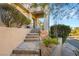 Inviting front entrance with stone steps and desert landscaping at 1635 Liege Dr, Henderson, NV 89012