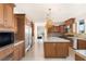 Gourmet kitchen with modern appliances and a large island at 1635 Liege Dr, Henderson, NV 89012