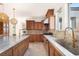 Spacious kitchen featuring granite countertops and stainless steel appliances at 1635 Liege Dr, Henderson, NV 89012