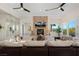 Spacious living room featuring a fireplace and large windows at 1635 Liege Dr, Henderson, NV 89012