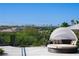 Round patio daybed with shade canopy, mountain views, and city skyline at 1635 Liege Dr, Henderson, NV 89012