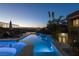 Stunning nighttime view of the pool and spa at 1635 Liege Dr, Henderson, NV 89012