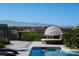 Luxury pool with daybed and mountain views at 1635 Liege Dr, Henderson, NV 89012