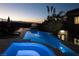 Stunning nighttime view of the pool and spa at 1635 Liege Dr, Henderson, NV 89012