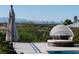 Relaxing poolside view with daybed and city views at 1635 Liege Dr, Henderson, NV 89012