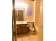 Clean bathroom with tiled floors, a toilet, and a bathtub at 1736 Williamsport St, Henderson, NV 89052