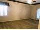 Spacious bedroom featuring carpeted floors and a door leading to outside at 1736 Williamsport St, Henderson, NV 89052