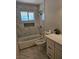 Bathroom with bathtub, toilet and vanity at 1920 Walnut Ave, Las Vegas, NV 89101