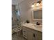 Clean bathroom, bathtub, toilet and white vanity at 1920 Walnut Ave, Las Vegas, NV 89101