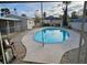 Oval-shaped swimming pool in backyard setting at 1920 Walnut Ave, Las Vegas, NV 89101