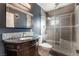 Main bathroom with a walk-in shower, vanity, and toilet at 1920 Wendell Ave, Las Vegas, NV 89101