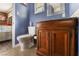 Updated bathroom with wood vanity, granite countertop, and mosaic tile accents at 1920 Wendell Ave, Las Vegas, NV 89101