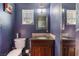 Bathroom with granite countertop and dark wood vanity at 1920 Wendell Ave, Las Vegas, NV 89101