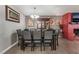 Dining room with a large table and a brick fireplace at 1920 Wendell Ave, Las Vegas, NV 89101