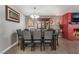 Dining room features a brick fireplace and gray chairs at 1920 Wendell Ave, Las Vegas, NV 89101