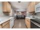 Kitchen with stainless steel appliances and a view of the dining area at 1920 Wendell Ave, Las Vegas, NV 89101