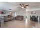 Open living and dining area with tile floors and ceiling fan at 1920 Wendell Ave, Las Vegas, NV 89101