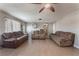 Spacious living room featuring tile floors and comfortable reclining furniture at 1920 Wendell Ave, Las Vegas, NV 89101