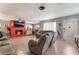 Living room with red brick fireplace and tile floors at 1920 Wendell Ave, Las Vegas, NV 89101