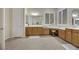 Bathroom with double sinks, vanity, and large mirror at 2080 Twin Falls Dr, Henderson, NV 89044