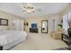 Spacious Primary bedroom with seating area and large windows at 2080 Twin Falls Dr, Henderson, NV 89044