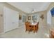 Dining area with wood table and chairs, near kitchen and access to other rooms at 2080 Twin Falls Dr, Henderson, NV 89044