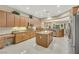 Large kitchen with island, stainless steel appliances, and ample counter space at 2080 Twin Falls Dr, Henderson, NV 89044