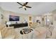 Relaxing living room, featuring comfortable seating and a large TV at 2080 Twin Falls Dr, Henderson, NV 89044