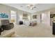 Main bedroom with ensuite bathroom access and sitting area at 2080 Twin Falls Dr, Henderson, NV 89044