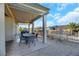 Covered patio with seating area and desert landscaping at 2080 Twin Falls Dr, Henderson, NV 89044