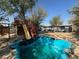 Backyard with playset and above ground pool at 2127 Crawford St, North Las Vegas, NV 89030