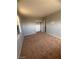 The bedroom has neutral paint, carpet and a closet at 2127 Crawford St, North Las Vegas, NV 89030