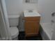 Clean bathroom with single sink vanity, toilet and bathtub at 2139 Crawford St, North Las Vegas, NV 89030