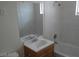 Clean bathroom with single sink vanity and bathtub at 2139 Crawford St, North Las Vegas, NV 89030