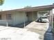 Home's exterior with carport and partial view of a vehicle at 2139 Crawford St, North Las Vegas, NV 89030