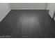 Dark gray laminate flooring in a bedroom at 2139 Crawford St, North Las Vegas, NV 89030