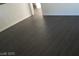 Dark gray laminate flooring in a room at 2139 Crawford St, North Las Vegas, NV 89030