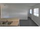 Kitchen features double sink and view into living area at 2139 Crawford St, North Las Vegas, NV 89030