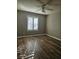 Bedroom with wood-look floors and window shutters at 2200 S Fort Apache Rd # 2050, Las Vegas, NV 89117